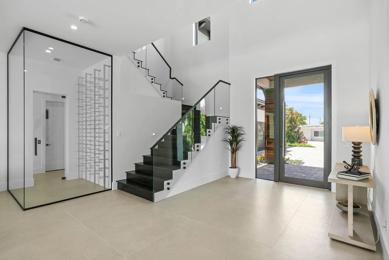 1172 S Harbor foyer with glass wine cellar enclosure and ES Prestige entry door