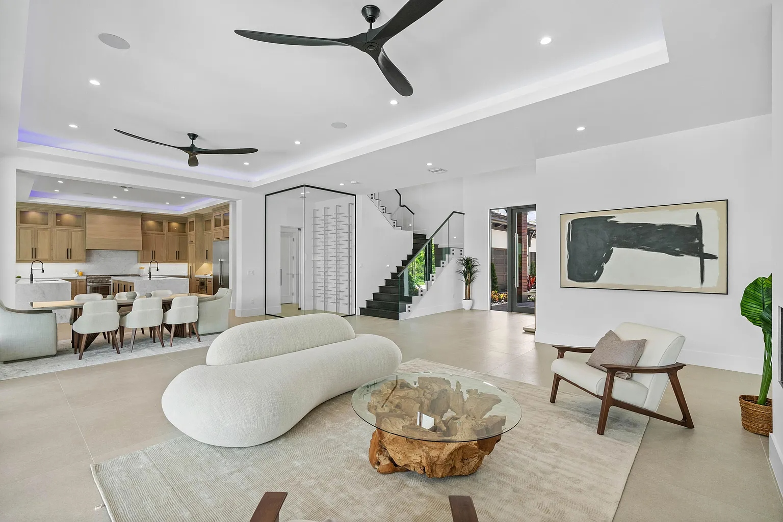 1172 S Harbor wide interior shot with glass doors and stair railing