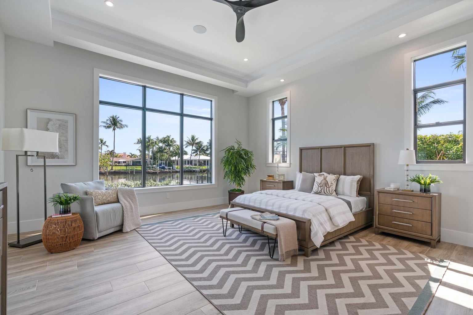 736 Lagoon Drive master bedroom with ESWindows picture window overlooking the lagoon