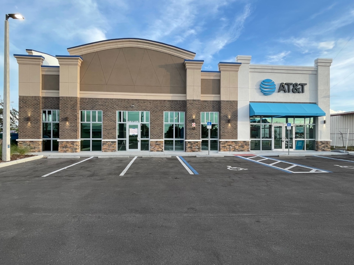 Aspen Dental retail plaza Edgewater FL — ESWindows storefront glazing