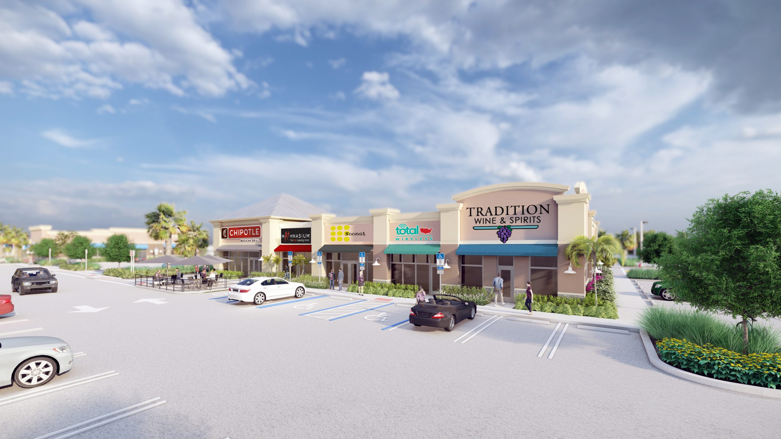 Baron Shoppes of Tradition Port St. Lucie — retail storefront glazing at dusk