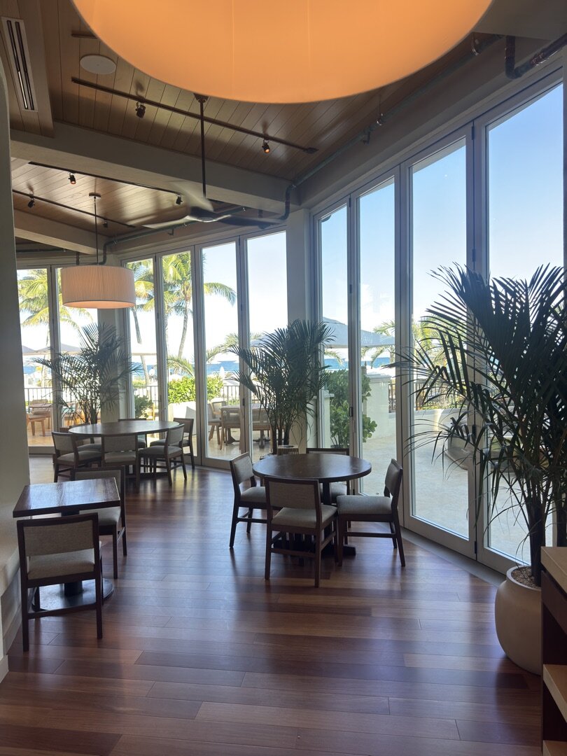 Kids Club at Eau Palm Beach — floor-to-ceiling glass with ocean views
