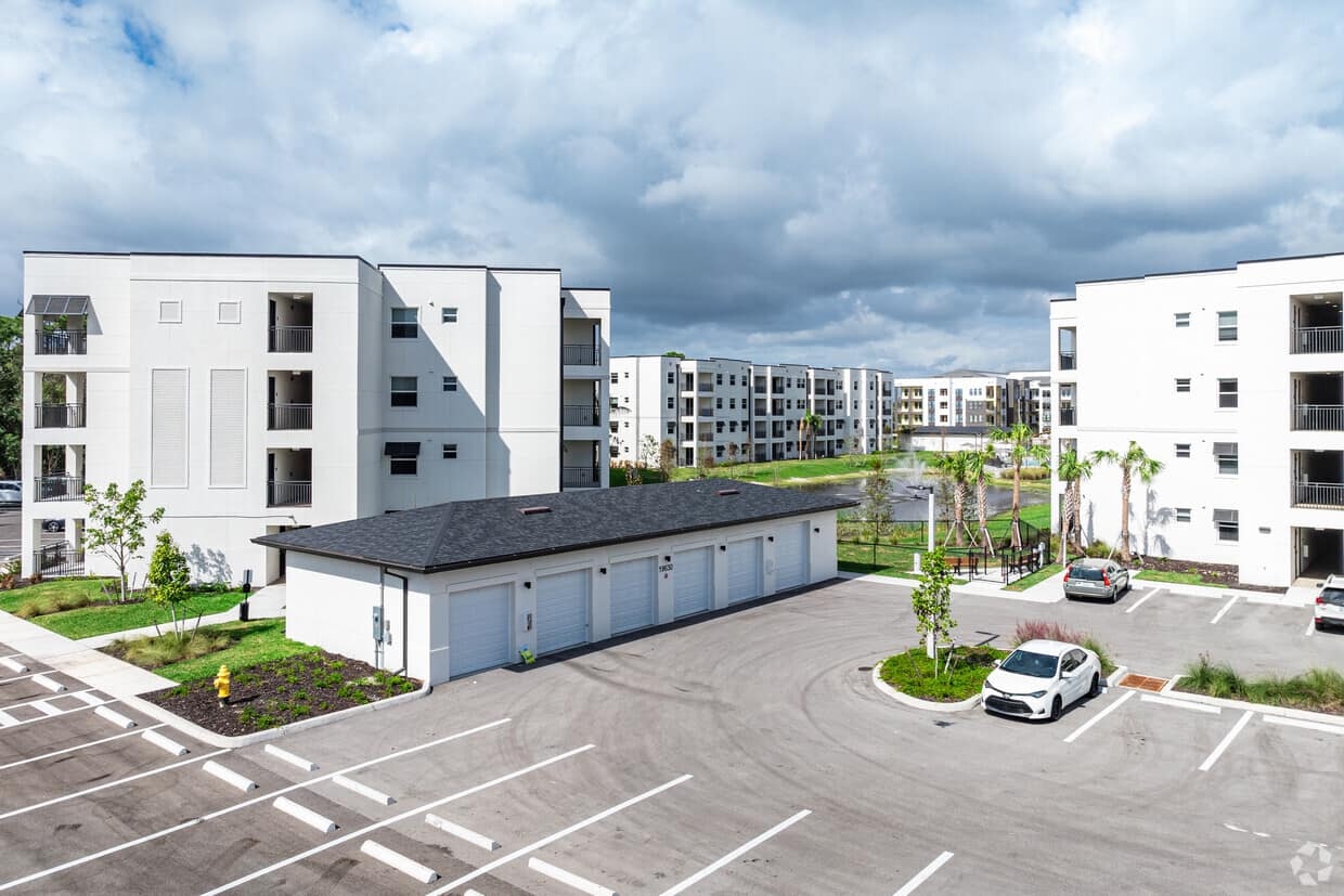 Estero Vista campus — multiple residential buildings with impact windows throughout