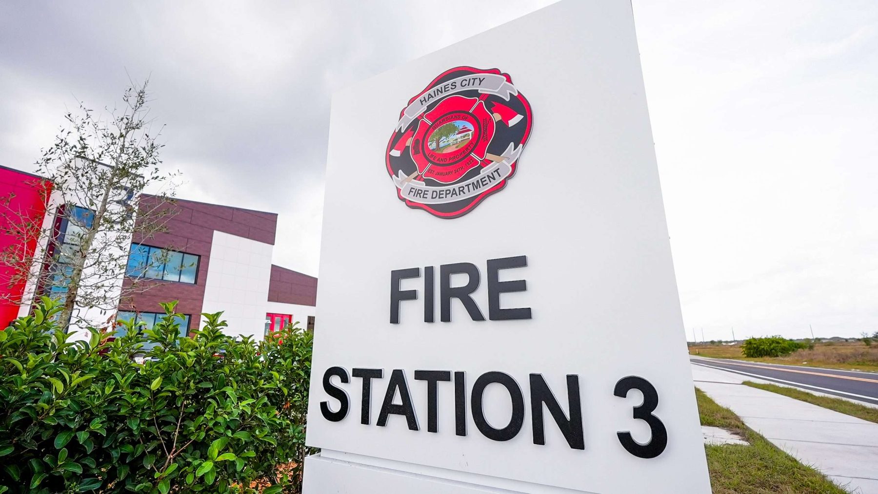 Fire Station 3 entry signage with the two-story tilt-wall facade behind