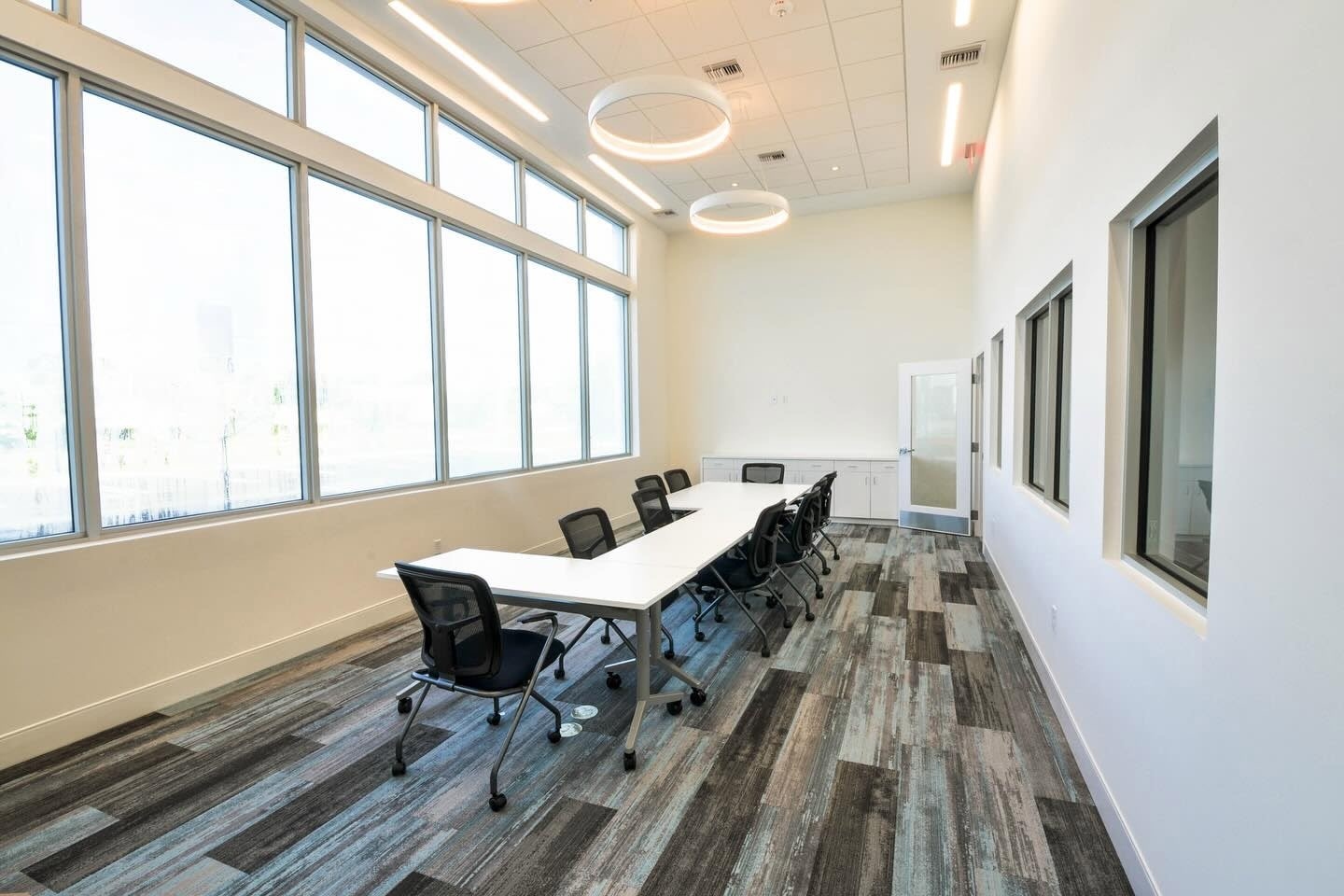 Hulett Environmental conference room — ESWindows commercial windows spanning the full wall