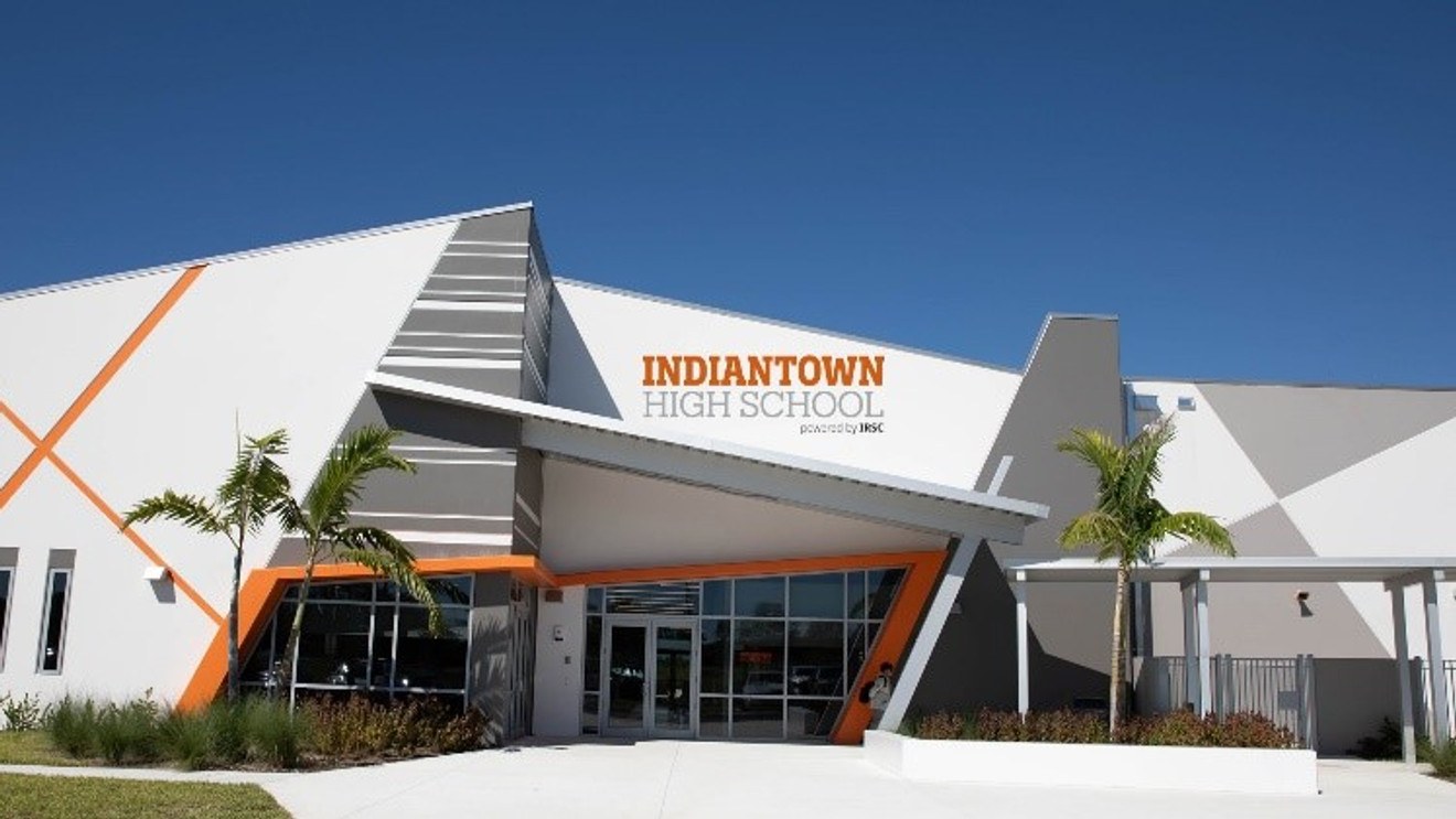 Signage block against the completed facade