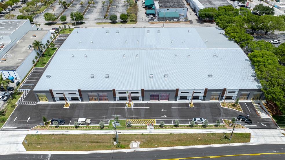 Medley Business Park — top-down aerial showing full building footprint and complete storefront run