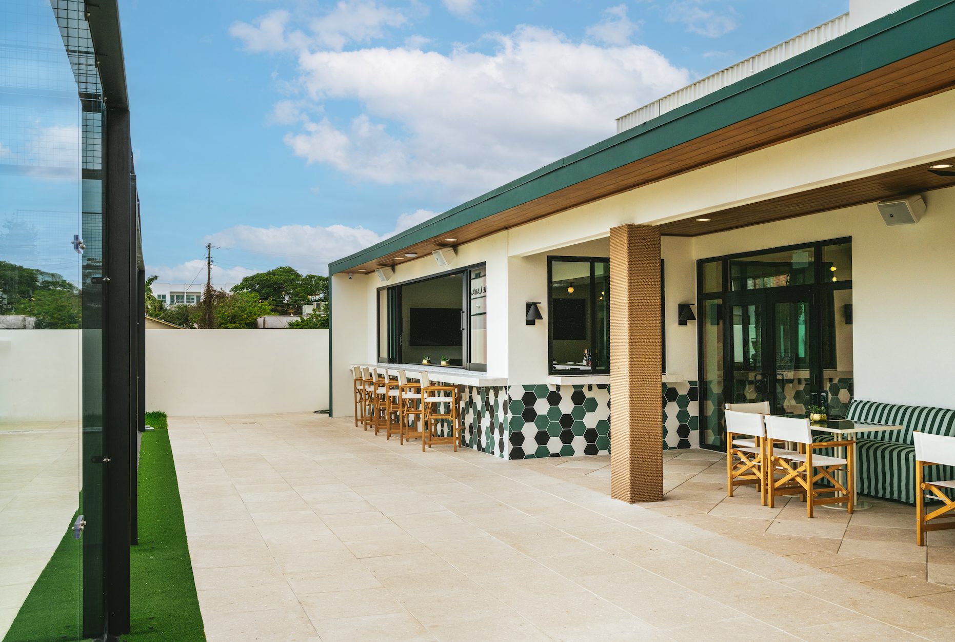 Padel Club West Palm Beach patio and bar opening - storefront glass by American Commercial Glass