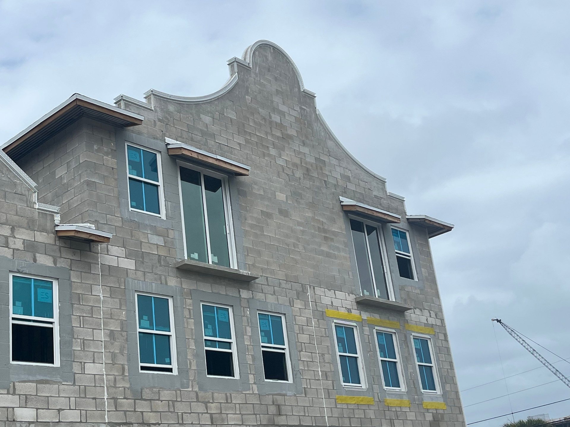 Villa L'Onz — Bermuda gable detail with installed impact windows