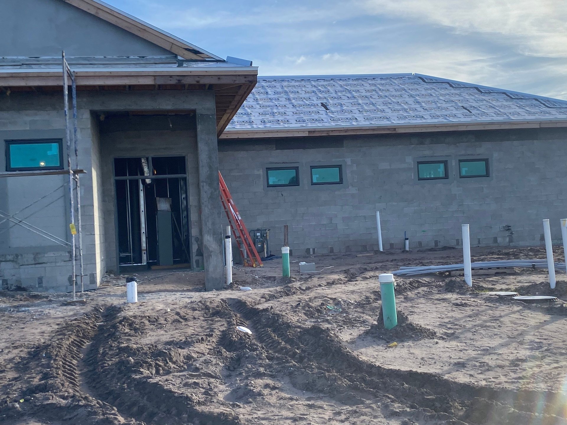 Wild Blue Clubhouse — exterior progress west elevation