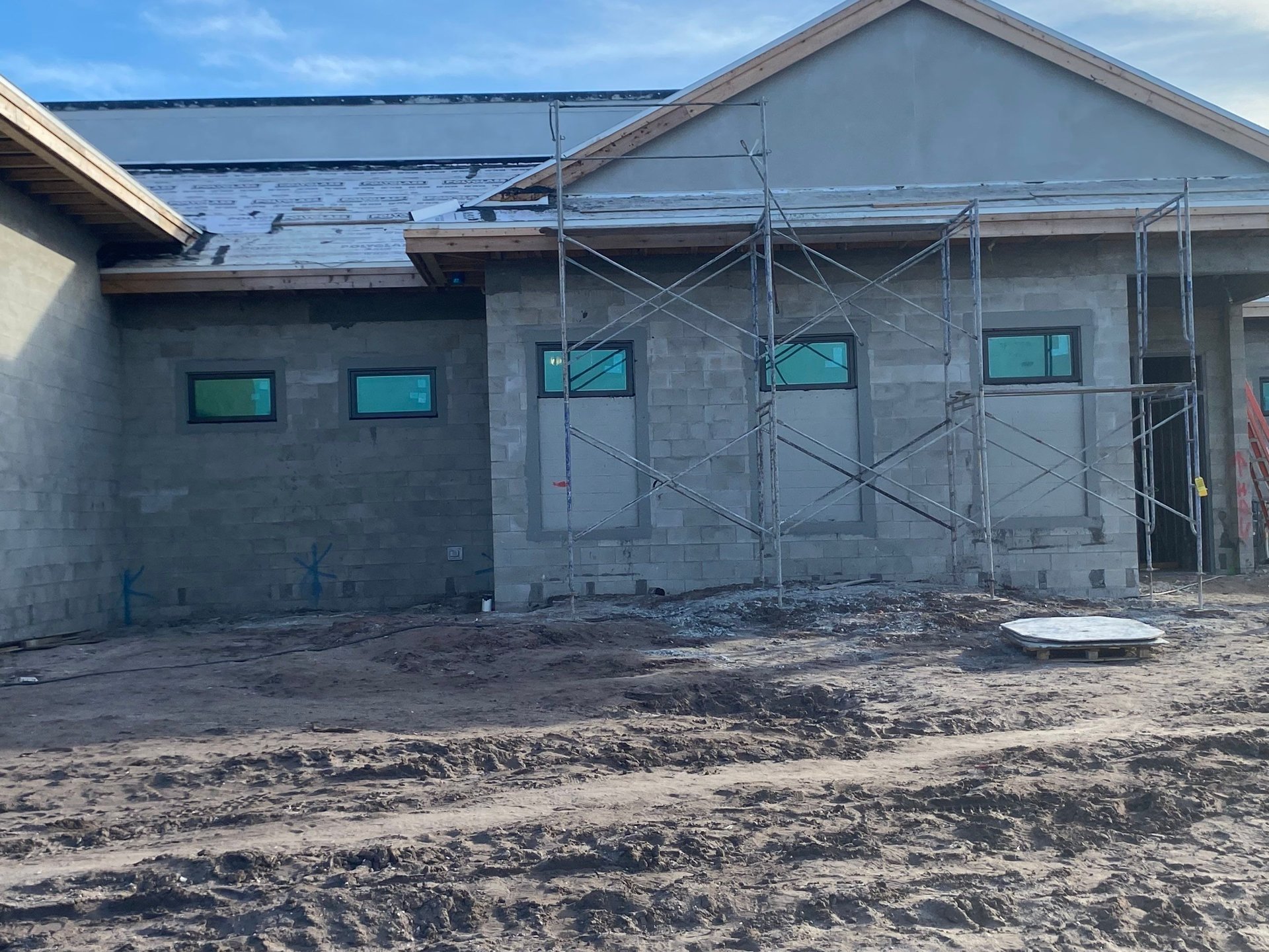 Wild Blue Clubhouse rear elevation onto the lawn and waterfront
