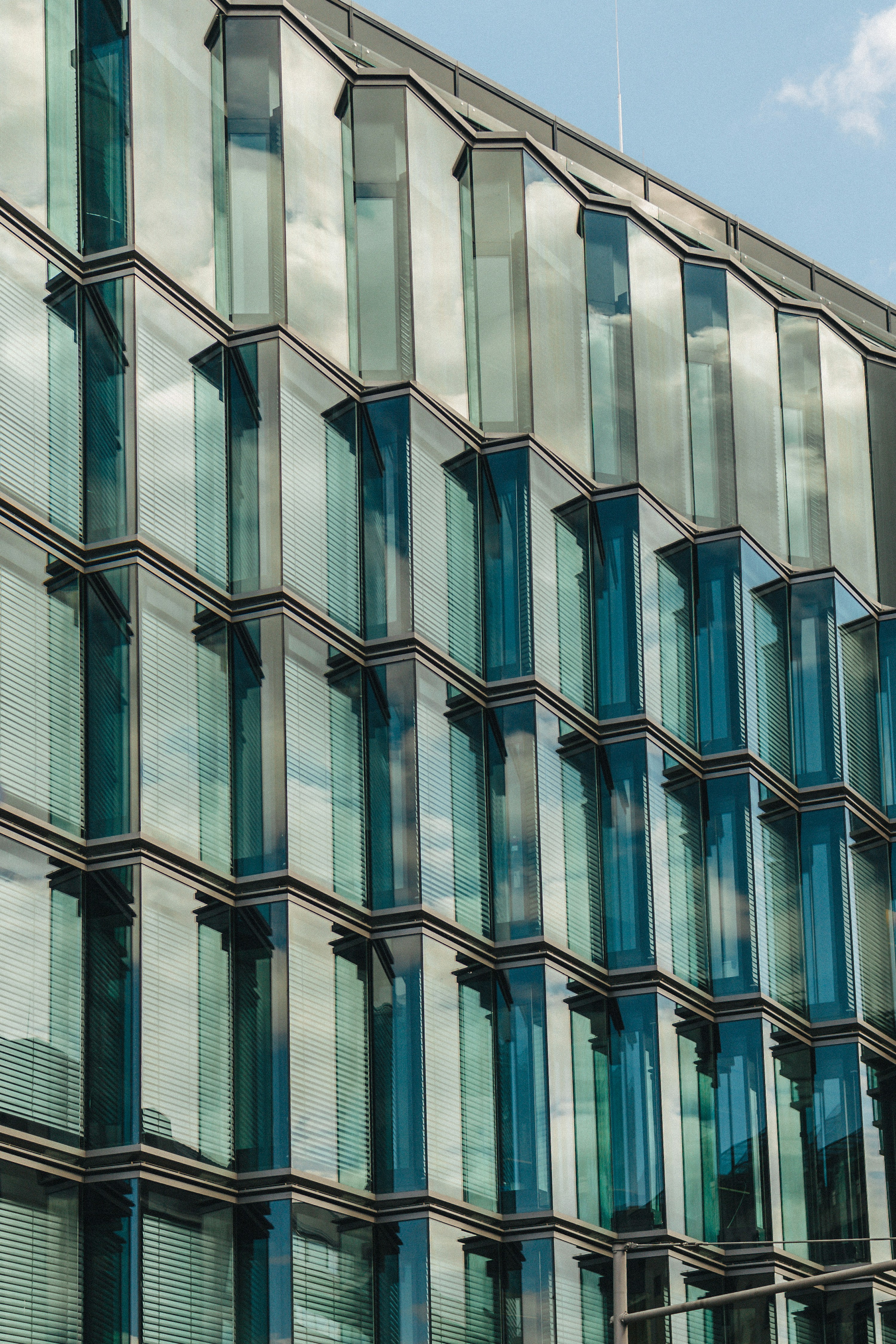 Modern luxury condominium with curtain wall facade — representative of ACG's multifamily commercial glazing portfolio
